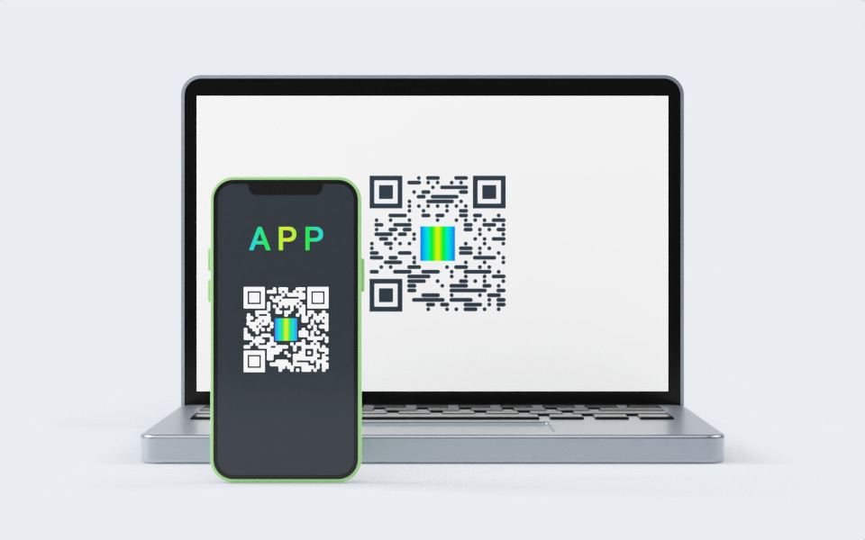 Laptop with WWPass QR-code and smartphone